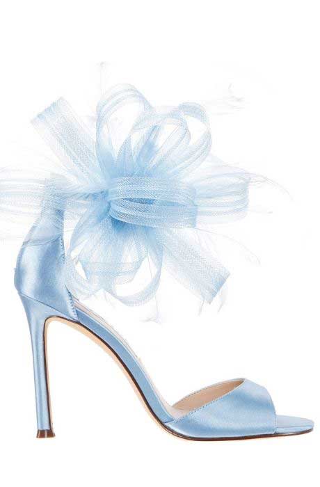 Nina wedding shoe with blue bow on top.