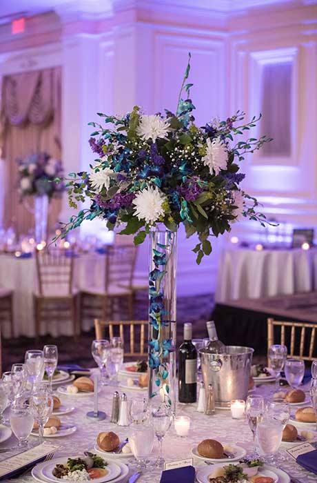 Blue and white tall flower centerpiece.