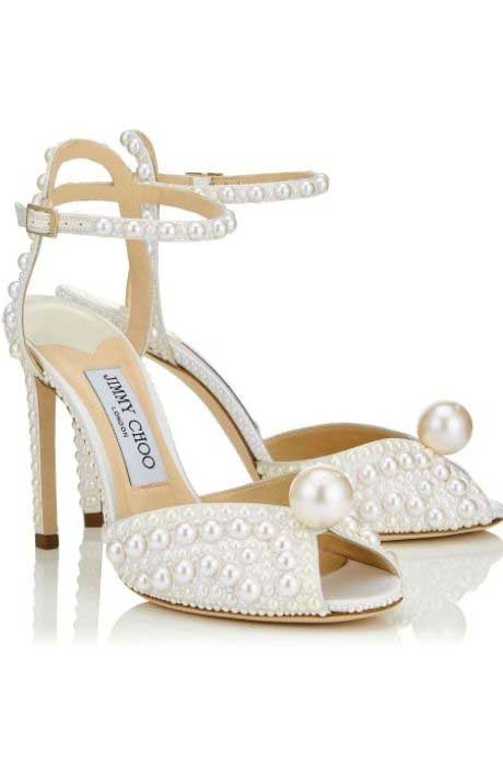 Jimmy Choo pearl high heels.