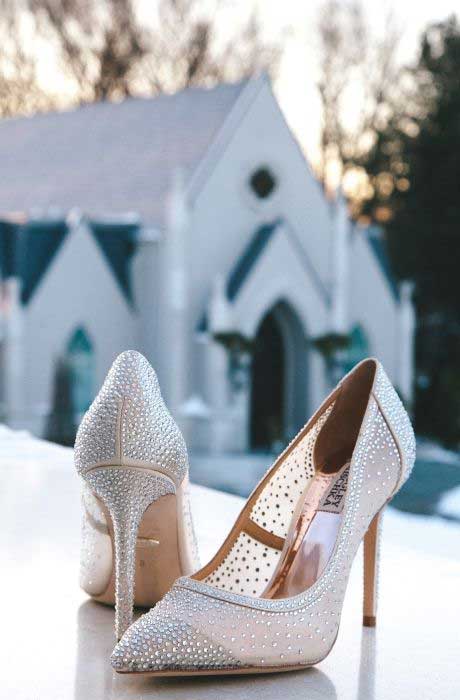 Wedding shoes in front of church.