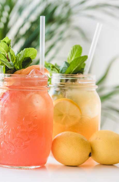 Different variations of lemonade flavors with a mint garnish. 